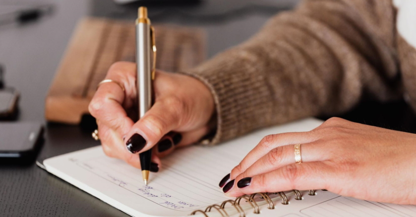 Woman taking notes